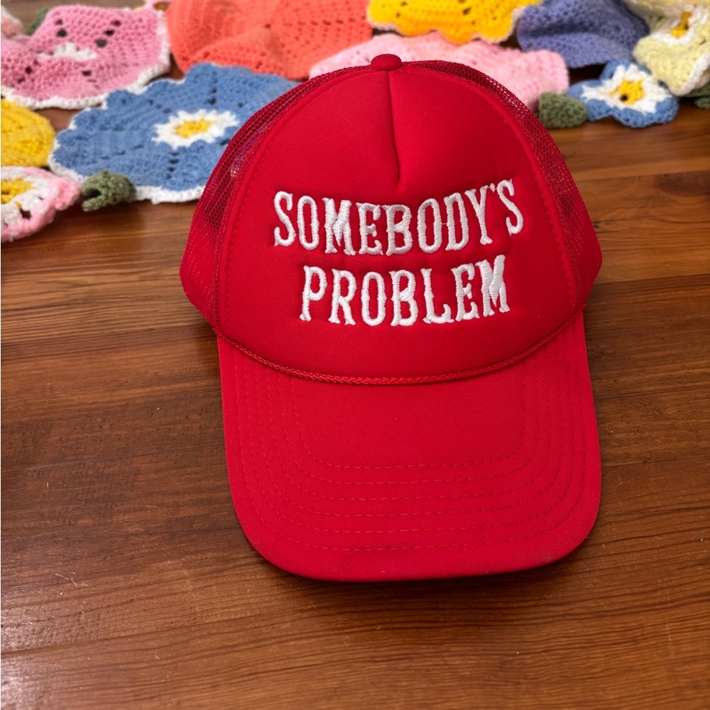 Somebody’s Problem trucker hat